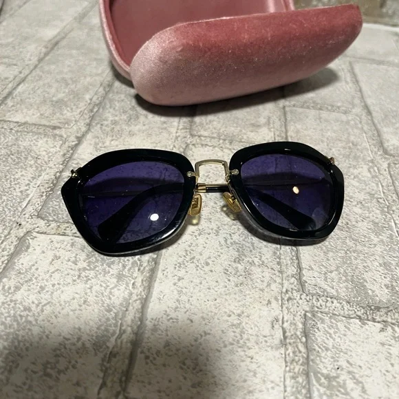 MIU MIU sunglasses SMU10NS 1AB-3M1 54023-135